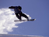 Snowboarding in Santa Fe, New Mexico, USA Photographic Print by Lee Kopfler