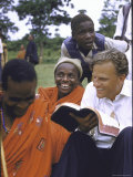 Evangelist Billy Graham Showing His Bible to the Waarusha Warriors Near Mt. Meru Premium Photographic Print by James Burke