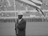 Rafer Johnson Leading USA Athletes During the Opening Day. 1960 Olympics. Rome, Italy Premium Photographic Print by Mark Kauffman
