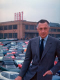 President of Fiat Gianni Agnelli Standing with Cars and Fiat Factory in Background Premium Photographic Print by David Lees