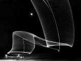 Light Pattern in the Moonlight Sky Produced by Time Exposure of Light Photographic Print by Andreas Feininger