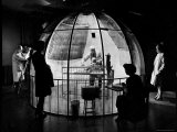 Dr. Arnold Gesell Studying Baby at Yale's Child Psychology Lab Premium Photographic Print by Herbert Gehr