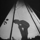 Woman Part of Group Riding Horseback Through Canadian Rockies Settling Into Tent for the Night Photographic Print by Wallace Kirkland