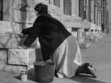 Housewife Washing Her White Stoop During Part of Her Daily Routine Photographie par Margaret Bourke-White