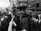 Sen. Robert Kennedy Standing on Roof of Car as He is Swamped by a Crowd of Welcoming Well Wishers Photographic Print by Bill Eppridge