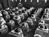 Elementary School Children with Heads Down on Desk During Rest Period in Classroom Photographie par Alfred Eisenstaedt