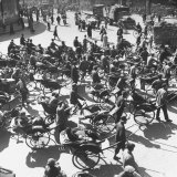 Richshaw's Loaded with Peddler's Pushcarts, Dollies Hand Trucks, Barrows, Pedi Cabs, and Bicycles Photographic Print by Mark Kauffman