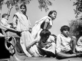 Children Watch Funeral Procession of Assassinated Indian Leader Mohandas K. Gandhi Premium Photographic Print by Margaret Bourke-White