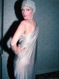 Actress Morgan Fairchild, Wearing Silver Dress and Mesh Hat Premium Photographic Print by David Mcgough