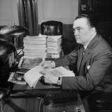 Director of the FBI J. Edgar Hoover Sitting at His Desk in His Office Premium Photographic Print by Thomas D. Mcavoy