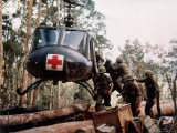 American 4th Battalion, 173rd Airborne Brigade Soldiers Loading Wounded Onto a 