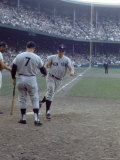 NY Yankees Right Fielder Roger Maris Crossing Home Plate Shaking Hands with Teammate Mickey Mantle Premium Photographic Print by Robert W. Kelley
