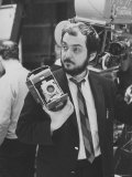 Film Director Stanley Kubrick Holding Polaroid Camera During Filming of "2001: A Space Odyssey" Premium-Fotodruck von Dmitri Kessel