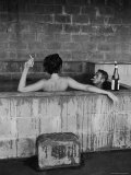 Actor Steve McQueen and Wife Taking Sulfur Bath at Home Reproduction photographique sur papier de qualité par John Dominis
