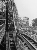 Thrill Seekers Getting a Hair Raising Ride on Cyclone Roller Coaster at Coney Island Amusement Park Photographic Print by Marie Hansen
