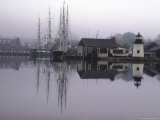 Scenic Harbor View with Masted Ships and Buildings Reflected in Placid Waters at Mystic Seaport Photographie par Alfred Eisenstaedt
