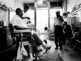 Musician Louis Armstrong in His Neighborhood Barber Shop Premium Photographic Print by John Loengard