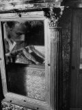 Pilgrim looks at Saint Francis Xavier's Missing Toe That Isabel de Carone Bit Off Premium Photographic Print by James Burke