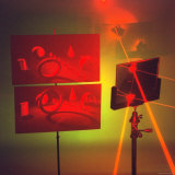 Hologram made by Juris Upatnieks projects on screens when lasers passes through different places Photographic Print by Fritz Goro
