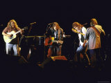 Musicians David Crosby, Neil Young, Graham Nash and Stephen Stills of Group Crosby Performing Stampa fotografica Premium di David Mcgough