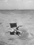 Alfred Wolf Spearfishing for Bonito from Rubber Raft During Vacation on Grand Bahama Island Photographic Print by Alfred Eisenstaedt