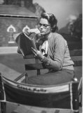 Actress Grace Kelly Studying Script for Her Role of Georgie in "The Country Girl" on movie set Premium Photographic Print by Ed Clark