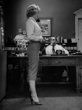 Actress Marilyn Monroe Talking Sexily on Phone While Displaying Her Talents for Producer Jerry Wald Premium Photographic Print by Bob Landry