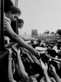 Eva Peron, Wife of Argentinean Presidential Candidate, Passing Out Campaign Buttons Premium Photographic Print by Thomas D. Mcavoy