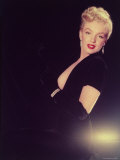 Actress Marilyn Monroe Wearing Low Cut Black Dress and Gloves, and Rhinestone Earrings Premium Photographic Print by Ed Clark