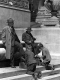 Shoeshine Boys Working on Businessmen's shoes on Front Steps of the New York Public Library Premium Photographic Print by Alfred Eisenstaedt