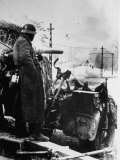 German Soldier Manning Gun Protect Wide Avenue from Enemy Forces During Fighting on Eastern Front Premium Photographic Print by Heinrich Hoffmann