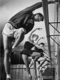 Olympic High Jumper Walter Davis Doing Ballet Exercises in Class of Women Dancers Premium Photographic Print by John Dominis