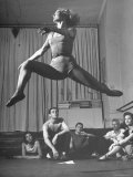 Dancer Valerie Bettis Demonstrating a Ballet Move for the Rest of Her Troupe Premium Photographic Print by Nina Leen