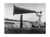 Man Blowing Bugle Into Large Megaphone, with Pitched Tents Behind Him, at US Naval Training Camp Photographic Print