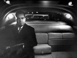 VP Richard Nixon Sitting Solemnly in Back Seat of Dimly Lit Limousine Photographic Print by Hank Walker