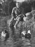 Mail Order Co. Founder Leon Leonwood Bean Testing Wooden Duck Decoys Premium Photographic Print by George Strock