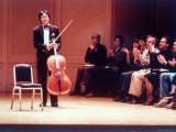 Master Cellist Yo-Yo Ma with Stradivarius Cello Receiving Applause after performing "Cello Suites" Reproduction photographique sur papier de qualité par Ted Thai