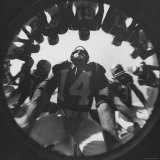 Eddie Lebaron of the Washington Redskins Huddling with His Teammates During a Game Premium Photographic Print by Hank Walker