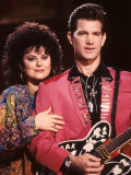 Delta Burke and Singer Chris Isaak Premium Photographic Print