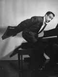 Comedian Pianist Victor Borge, in White Tie and Tails, Standing at Piano and Making Funny Faces, Photographic Print