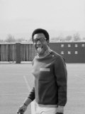 Comedian Bill Cosby Sticking His Tongue Out During Game of Basketball Premium Photographic Print by Michael Rougier