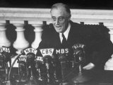 President Franklin D. Roosevelt Sitting in Front of a Network Radio Microphones Photographic Print by George Skadding