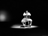 Boxer Joe Frazier Sitting on a Chair under a Spotlight Premium Photographic Print by John Shearer