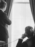 Pres. John F. Kennedy on Telephone While Brother, Attorney General Robert F. Kennedy Stands Nearby Photographic Print by Art Rickerby