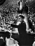 President John Kennedy Next to His Wife Jacqueline Overlooking Crowd Attending His Inaugural Ball Photographic Print by Paul Schutzer