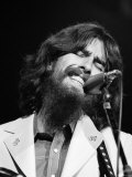 George Harrison Performing at a Rock Concert Benefiting Bangladesh, aka Kampuchea Premium Photographic Print by Bill Ray