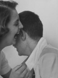 HS Senior Judy Krug Laughs Into Friend's Ear shows Why She Was Considered Most Talkative in School Photographie par Gordon Parks