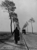Displaced Person Returning Home from German Prison Camp, Walking Down Country Road Premium Photographic Print by Ralph Morse