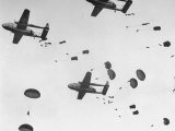 Scores of Paratroopers Dropping from C-82 "Flying Boxcar" and Landing on Level Ground Premium Photographic Print by Frank Scherschel