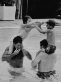 Attorney General Robert Kennedy and Pierre Salinger Playing with the Children in the Pool Premium Photographic Print by George Silk Attorney General Robert Kennedy and Pierre Salinger Playing with the Children in the Pool Premium Photographic Print by George Silk